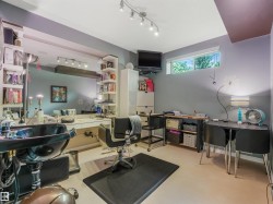 Recessed window, track lighting, built-in mirror, built-in shelving, hard surface flooring - 