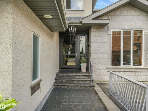 Stucco and stone exterior with decorative trim - 967 Lamb Crescent Nw, Edmonton, AB - Outdoor