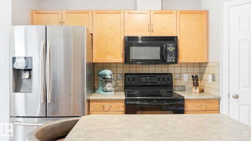 #58 8304 11 Av Sw, Edmonton, AB - Indoor Photo Showing Kitchen