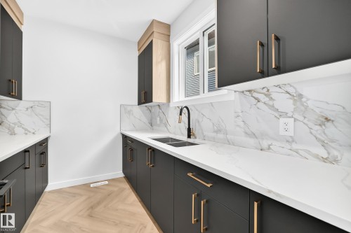 55 Meadowgrove Lane, Spruce Grove, AB - Indoor Photo Showing Kitchen With Double Sink