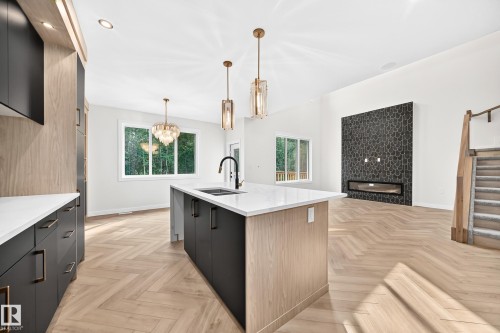 55 Meadowgrove Lane, Spruce Grove, AB - Indoor Photo Showing Kitchen With Double Sink With Upgraded Kitchen