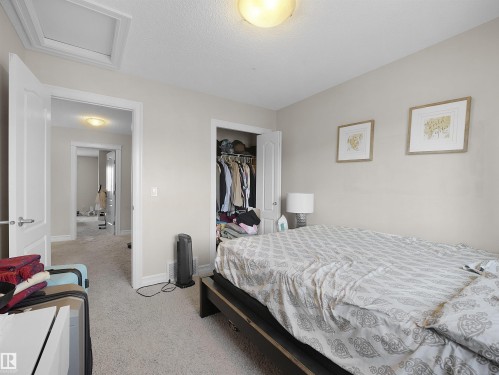 Neutral-toned walls complement plush carpet flooring - 17127 126 Street Nw, Edmonton, AB - Indoor Photo Showing Bedroom