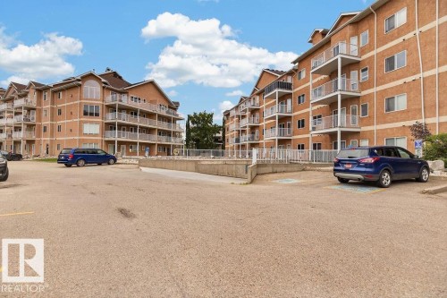 Multi-level brick exterior with multiple private balconies - #205 4304 139 Av Nw, Edmonton, AB - Outdoor With Balcony With Facade