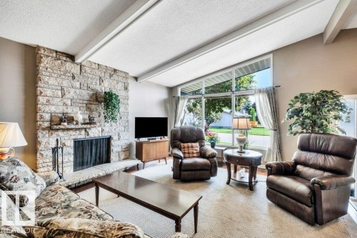 72 Ekota Crescent Nw, Edmonton, AB - Indoor Photo Showing Living Room With Fireplace