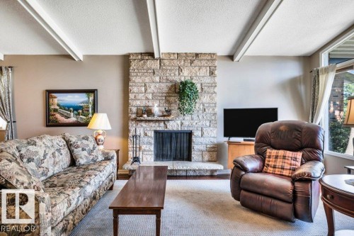 72 Ekota Crescent Nw, Edmonton, AB - Indoor Photo Showing Living Room With Fireplace