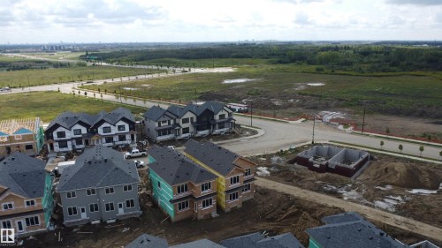 New construction residential development with paved streets and established homes - 13118 186 Avenue Nw, Edmonton, AB - Outdoor With View