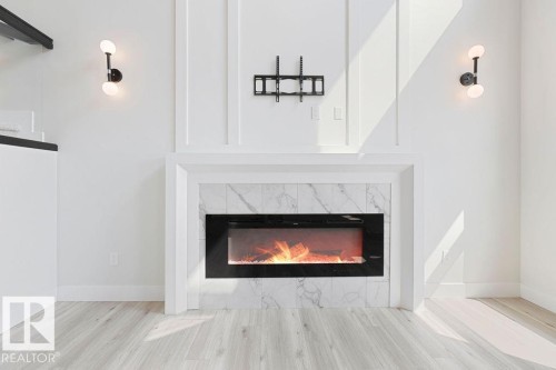 9331 181 Avenue Nw, Edmonton, AB - Indoor Photo Showing Living Room With Fireplace
