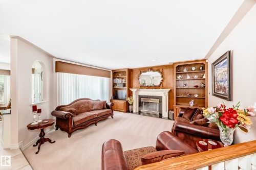 17416 53 Avenue Nw, Edmonton, AB - Indoor Photo Showing Living Room With Fireplace