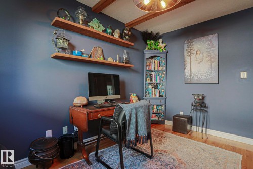 Hardwood-style flooring with painted walls - 12 Douziech Close, St. Albert, AB - Indoor Photo Showing Office