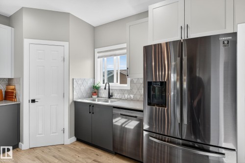 16635 30 Avenue Sw, Edmonton, AB - Indoor Photo Showing Kitchen With Double Sink