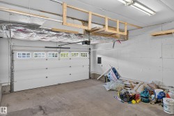 White garage door with upper window panels - 
