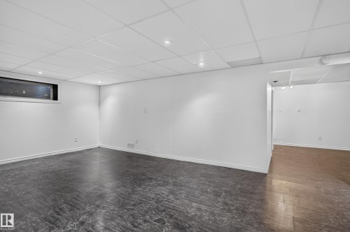 Spacious basement featuring polished concrete flooring, recessed lighting throughout, and clean white walls - 1315 Westerra Drive, Stony Plain, AB - Indoor Photo Showing Other Room