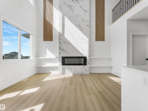 760 32 Street Sw, Edmonton, AB - Indoor Photo Showing Other Room With Fireplace