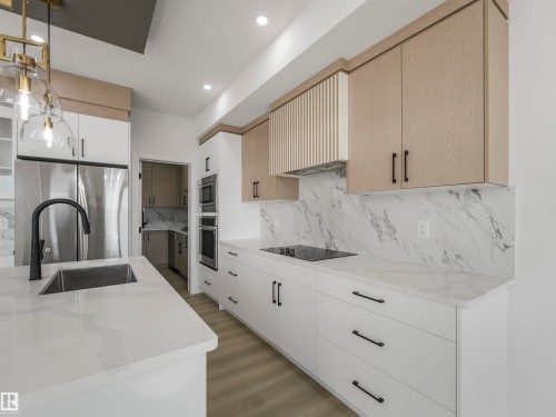 760 32 Street Sw, Edmonton, AB - Indoor Photo Showing Kitchen With Upgraded Kitchen