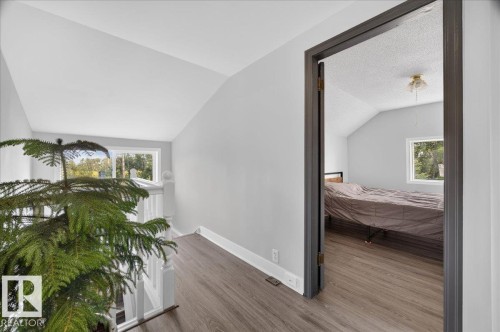 Wood-finish flooring throughout, white painted walls, and window overlooking exterior - 543069 Range Road 191, Rural Lamont County, AB - Indoor