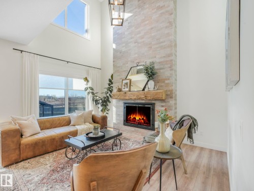 6613 62 Avenue, Beaumont, AB - Indoor Photo Showing Living Room With Fireplace