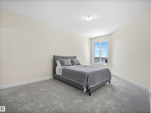 #1 7800 94 St, Morinville, AB - Indoor Photo Showing Bedroom