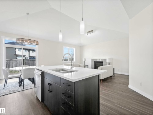 #1 7800 94 St, Morinville, AB - Indoor Photo Showing Kitchen With Double Sink