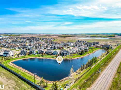 #2 7800 94 St, Morinville, AB - Outdoor With Body Of Water With View
