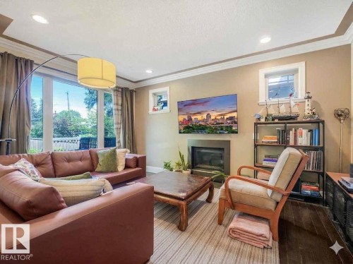 10230 148 Street Nw, Edmonton, AB - Indoor Photo Showing Living Room With Fireplace