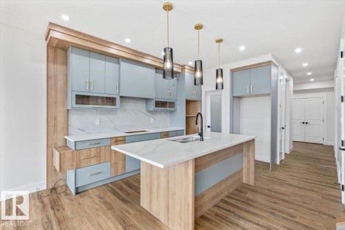 69 Elliott Wynd, Fort Saskatchewan, AB - Indoor Photo Showing Kitchen With Upgraded Kitchen