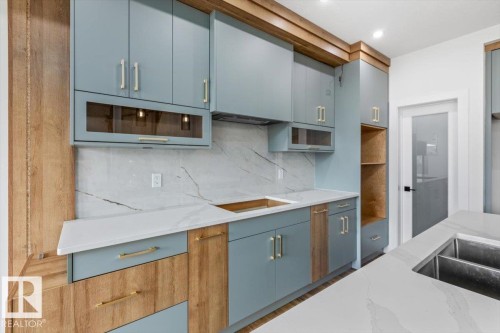 69 Elliott Wynd, Fort Saskatchewan, AB - Indoor Photo Showing Kitchen With Double Sink