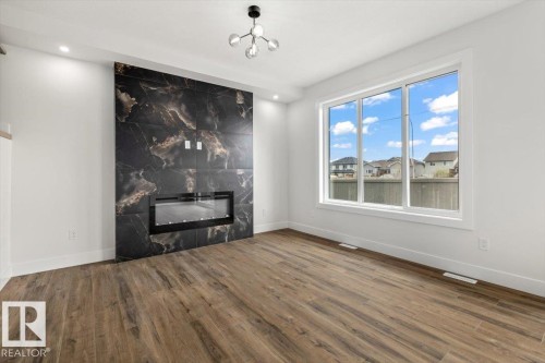 69 Elliott Wynd, Fort Saskatchewan, AB - Indoor With Fireplace