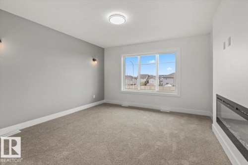 69 Elliott Wynd, Fort Saskatchewan, AB - Indoor Photo Showing Other Room
