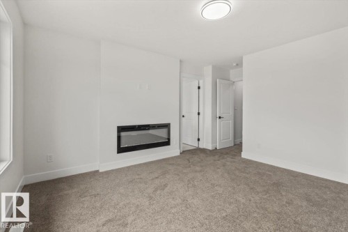 69 Elliott Wynd, Fort Saskatchewan, AB - Indoor With Fireplace