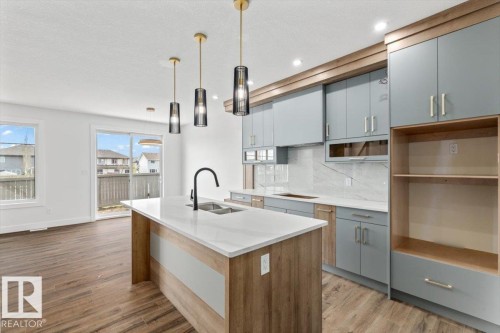 69 Elliott Wynd, Fort Saskatchewan, AB - Indoor Photo Showing Kitchen With Double Sink With Upgraded Kitchen