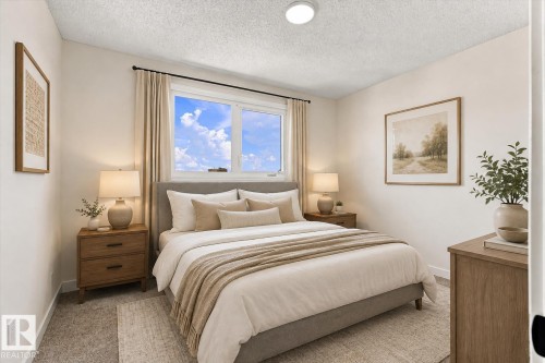 Large window with white frame, neutral-toned walls, recessed ceiling lighting, and carpeted flooring - 18307 66 Avenue Nw, Edmonton, AB - Indoor Photo Showing Bedroom