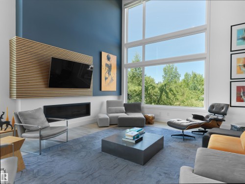 703 Dalhousie Way Nw, Edmonton, AB - Indoor Photo Showing Living Room With Fireplace