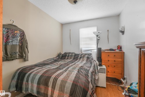 Additional content - 12209 94 Street Nw, Edmonton, AB - Indoor Photo Showing Bedroom
