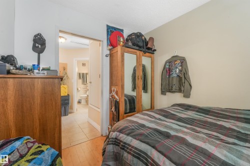 Additional content - 12209 94 Street Nw, Edmonton, AB - Indoor Photo Showing Bedroom