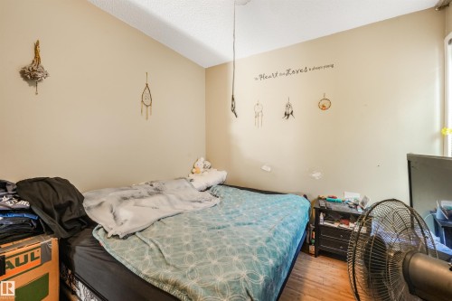 Additional content - 12209 94 Street Nw, Edmonton, AB - Indoor Photo Showing Bedroom