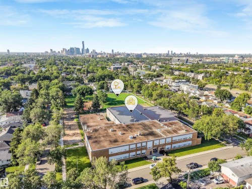 Expansive neighborhood with a verdant tree canopy and distant skyline - 12209 94 Street Nw, Edmonton, AB - Outdoor With View