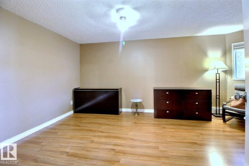 #411 4220 139 Av Nw, Edmonton, AB - Indoor Photo Showing Other Room