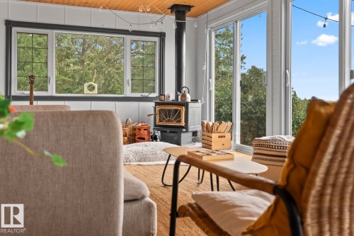 623/624 11102 Twp Road 600, Rural St. Paul County, AB - Indoor With Fireplace