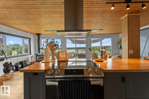 623/624 11102 Twp Road 600, Rural St. Paul County, AB - Indoor Photo Showing Kitchen With Double Sink