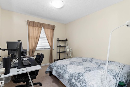 8521 8 Avenue Sw, Edmonton, AB - Indoor Photo Showing Bedroom