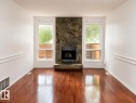 18625 66 Avenue Nw, Edmonton, AB  - Indoor Photo Showing Living Room With Fireplace 