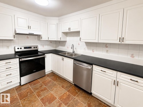 18625 66 Avenue Nw, Edmonton, AB - Indoor Photo Showing Kitchen With Stainless Steel Kitchen With Double Sink