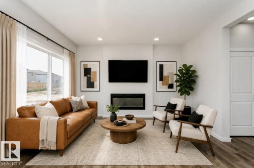 325 Linden Loop, Leduc, AB - Indoor Photo Showing Living Room With Fireplace
