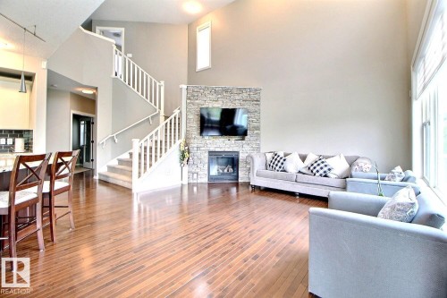 1231 37A Avenue Nw, Edmonton, AB - Indoor Photo Showing Living Room With Fireplace