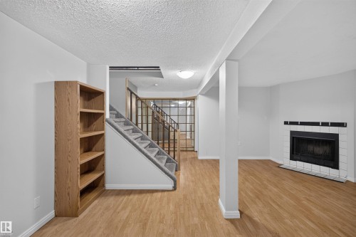 6235 13 Avenue Nw, Edmonton, AB - Indoor With Fireplace