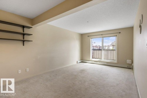 #203 5951 165 Av Nw, Edmonton, AB - Indoor Photo Showing Other Room