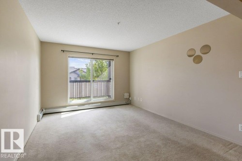 #203 5951 165 Av Nw, Edmonton, AB - Indoor Photo Showing Other Room