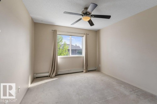 #203 5951 165 Av Nw, Edmonton, AB - Indoor Photo Showing Other Room