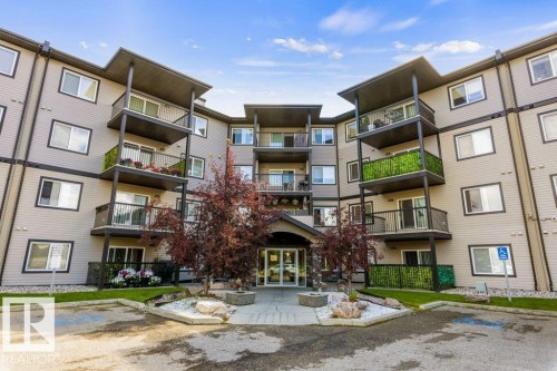 #203 5951 165 Av Nw, Edmonton, AB - Outdoor With Facade