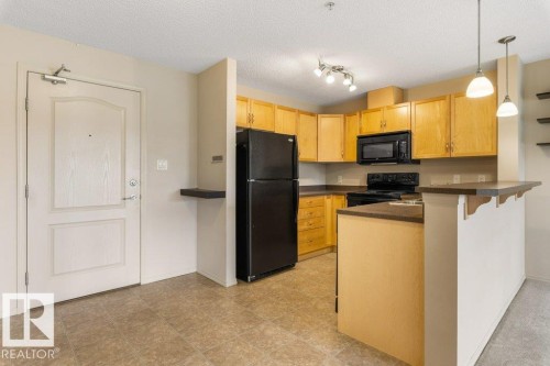 #203 5951 165 Av Nw, Edmonton, AB - Indoor Photo Showing Kitchen